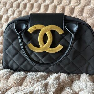 Black Quilted Handbag with Gold Accents